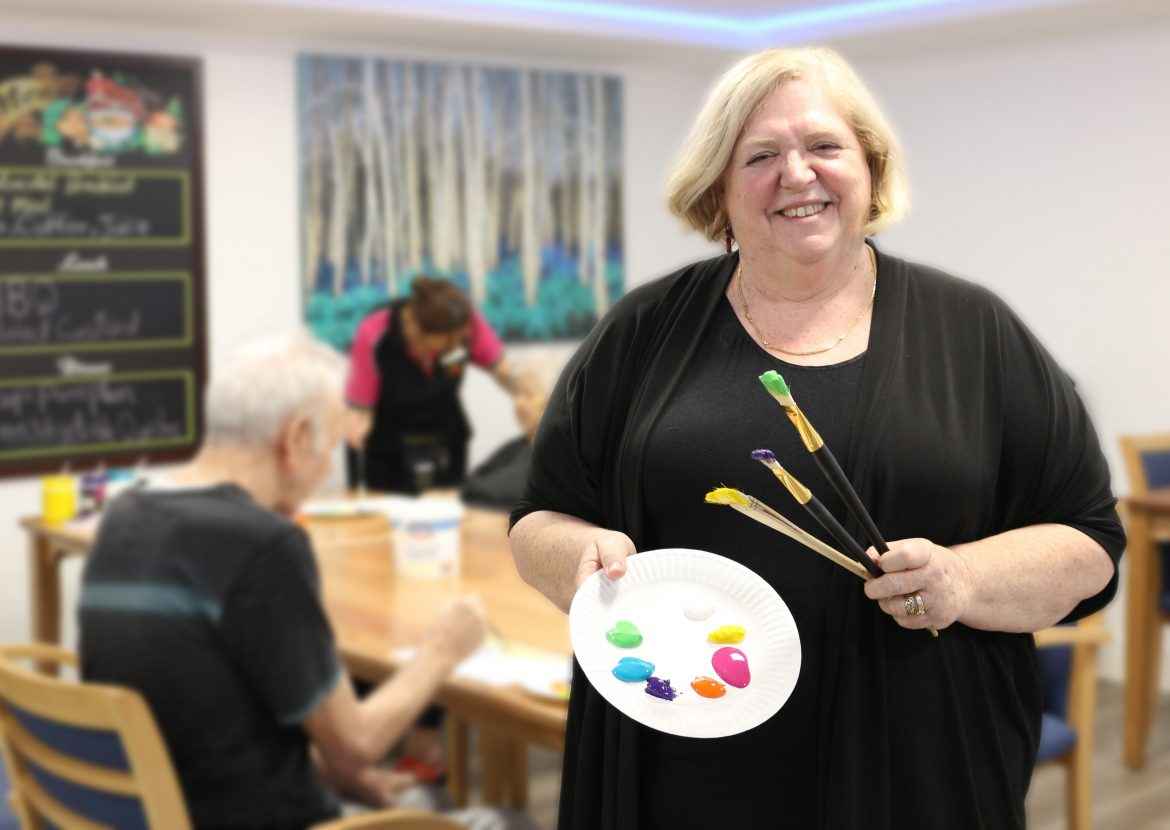 Judy Muir volunteers to run an art therapy class at Southhaven Aged Care.